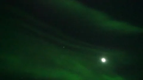Aurora Borealis dancing across a clear night sky over the Lofoten Islands Stockbeeldmateriaal 335119259