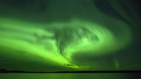 Aurora Borealis look like ghost over lake Stock Footage 250293659