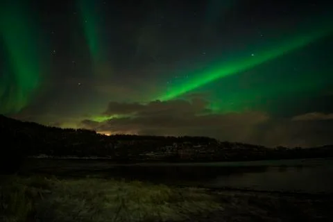 Aurora Borealis (Northern lights) at a lake in Norway Stock Photos