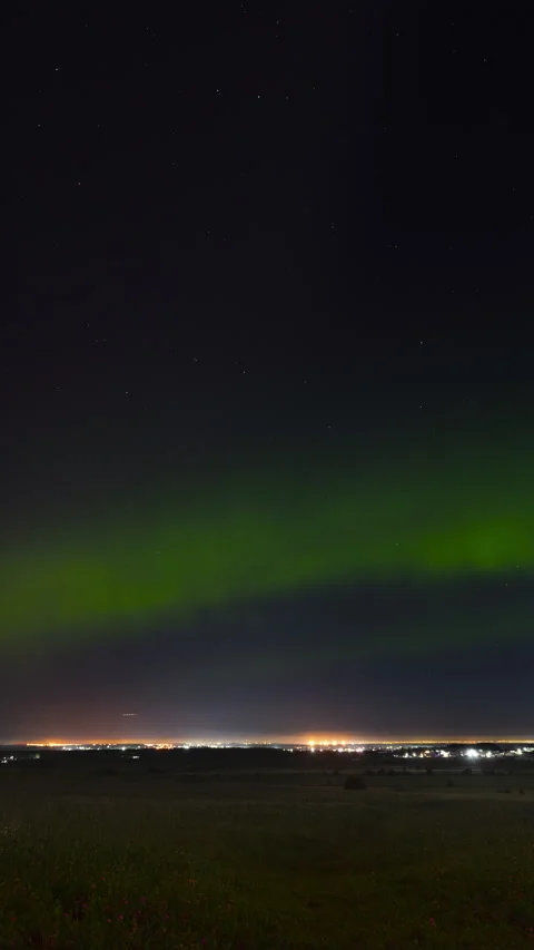 Aurora Borealis Over Field and City With Landing Jets Timelapse Stock Footage 331224376