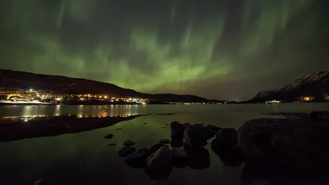 Aurora Borealis over lake Stock Footage 87952652