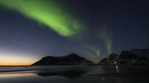 Aurora Borealis over a sandy beach Stock Footage 251345043