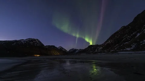 Aurora Borealis reflected in wet sand Stock Footage 251358558