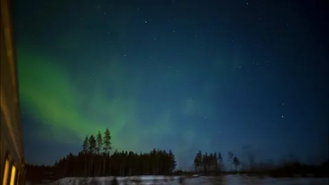 Aurora Borealis Sky line Train POV Northern Lights in Forest Blue and Video stock 260447989