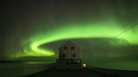 Aurora Borealis surrounding the lighthouse Stock Footage 269704719