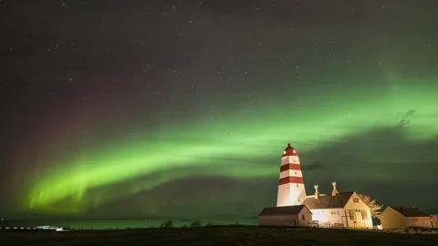 Aurora Borealis with tall lighthouse tower Stock Footage 250794763