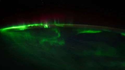 Aurora Borealis time lapse above the earth - Some elements furnished by NASA Stock Footage 106614499