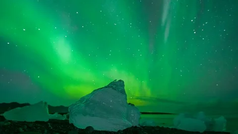 Aurora Borealis Time Lapse over Icebergs on Diamond Beach Stock Footage 126198897