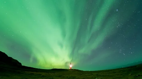 Aurora Borealis Time Lapse Over a Lighthouse Stock Footage 126199013