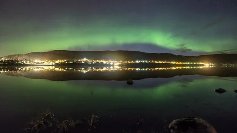 Aurora Borealsis over lake Stock Footage 87786689