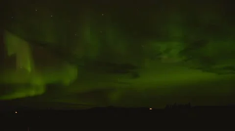 Aurora Dancing with Clouds over Alaskan Countryside 1a Stock Footage 12251763