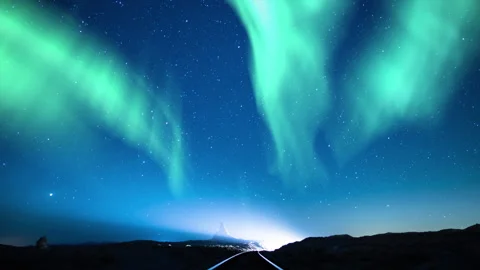 Aurora Green Starry Sky Train Track Tilt Down Stock Footage 238044317