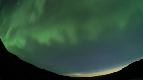 Aurora Sunrise between mountains Stock Footage 57330757