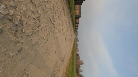Auschwitz barracks on a cold, cloudy winter day in Poland, capturing the so.. Stock Footage 292738908