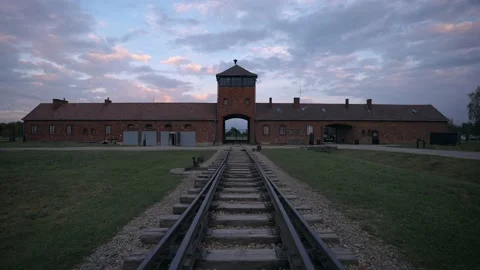 Auschwitz Birkenau Main Gate of Concentration Camp. Holocaust trains railway. Stock Footage 219284779