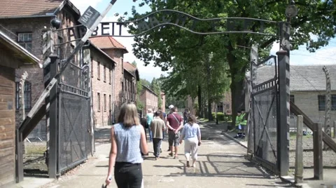 Auschwitz Concentration Camp - barracks and barbed wire Stock Footage 65750950