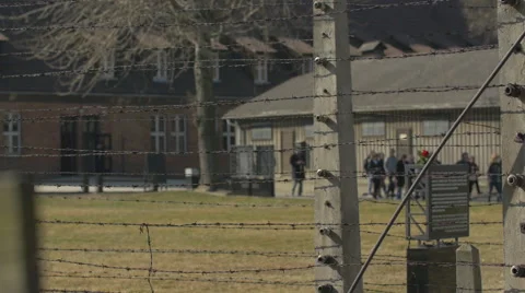 Auschwitz Concentration Camp behind the barbed wire fence Stock Footage 48717972