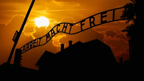 Auschwitz: Gate of the Concentration Camp, Time Lapse at Sunset with Red Sun Stock Footage 157735932