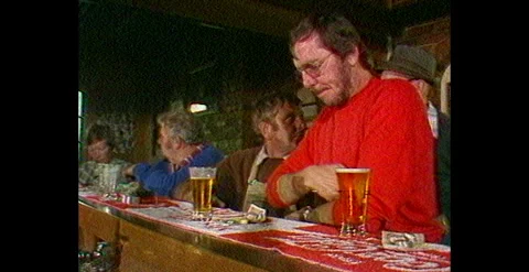Aussie Man Drinking Beer at Australian Pub – Indoor Bar Scene (1982) Stock Footage 310439806