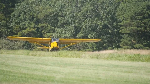 AUSTER YELLOW AIRPLANE TAKING OFF Stock Footage 29994845