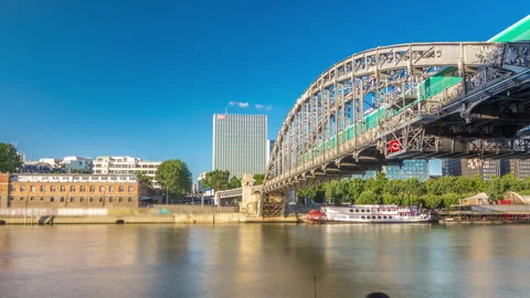 The Austerlitz viaduct in Paris timelapse hyperlapse, seen from bank of the Stock Footage 241325381