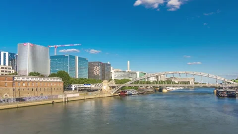 The Austerlitz viaduct in Paris timelapse hyperlapse, seen from bank of the Stock Footage 241325385