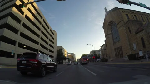 Austin Texas Crossing an intersection at a traffic light in a city Stock-Footage 153360012