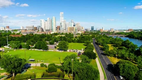 Austin Texas Skyline with Lady Bird Lake and Downtown Cityscape Stock Footage 307235509