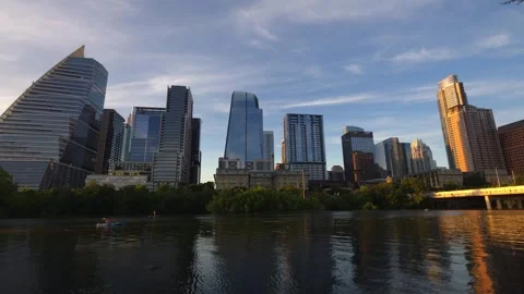 Austin Texas Skyline Lady Bird Lake and Historic Bridges Wide Establishing Shot Stock Footage 338360153