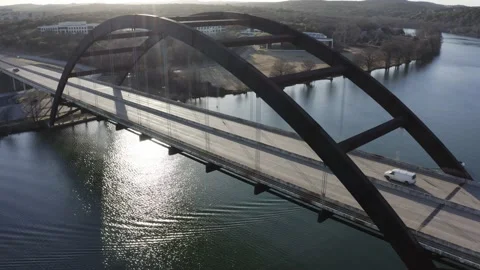 Austin Texas Skyline, Orbit, second angle Austin Sunset 4K, PennyBaker Bridge Stock Footage 235943290
