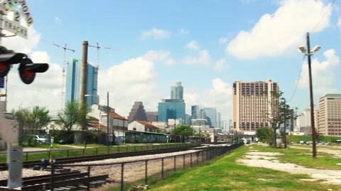 Austin Texas Skyline Passing Over Train Tracks Stock Footage 79018976