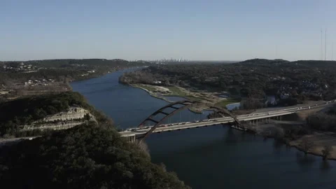 Austin Texas Skyline, Push in, Austin Sunset 4K, PennyBaker Bridge, 360 Bridge Stock Footage 235943323