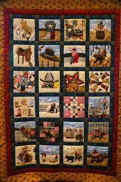 Austin, Texas, U.S.A - April 9, 2024 - The colorful quilt displayed inside .. Stock Photos