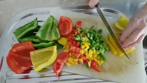 AUSTRALIA-Cutting up capsicums Stock Footage 84707727