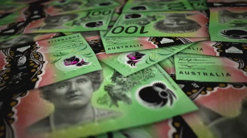 Australia Dollar 100 banknote flying over money surface Stock Footage 226547558