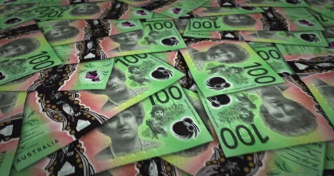 Australia Dollar 100 banknote flying over money surface Stock Footage 226788271