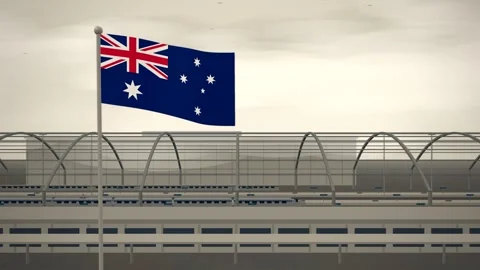 Australia Flag Flying Over High Speed Rail Station seamless loop Stock Footage 344849188