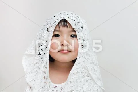 Australia, Melbourne, Portrait of young girl in lace hood Stock Photos