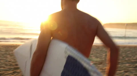 Australia Surfer Jogs Across Beach and Into Ocean Stock Video Stock Footage 34370753