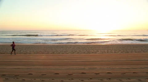 Australia Surfer Jogs Across Beach and Into Ocean Stock Video Stock-Footage 34370905