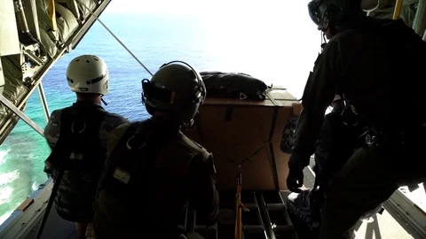 Australian Air Force push cargo on parachute from C-130J Hercules over Guam 스톡 동영상 83351368