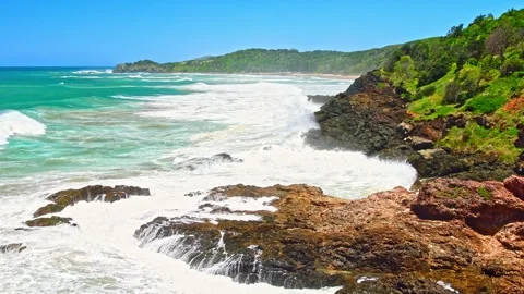 Australian coast, view from a cliff to the blue ocean with a rocky shore on.. Stock Footage 273601484