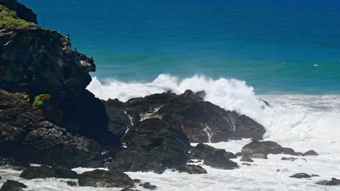 Australian coast, view from a cliff to the blue ocean with a rocky shore on.. Stock Footage 273602384