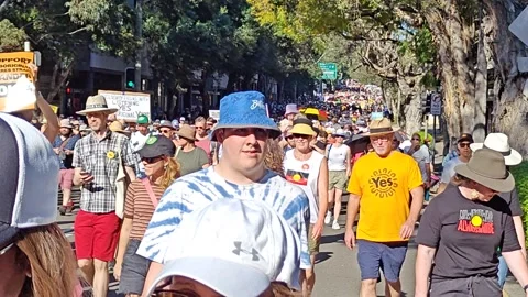 AUSTRALIAN CROWDS MARCHING IN SUPPORT OF REFERENDUM YES VOTE NSW 4K Stock Footage 250447779