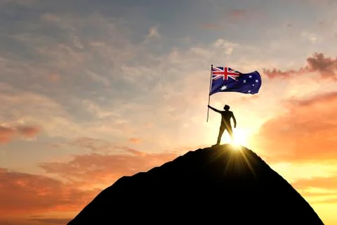 Australian flag being waved at the top of a mountain summit. 3D Rendering Illustrazione stock