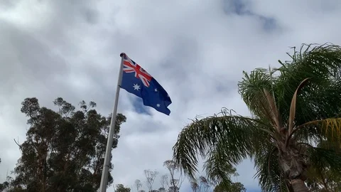 Australian Flag flying Stock Footage 112930561