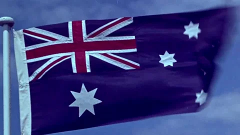 AUSTRALIAN FLAG WAVES IN THE WIND (1950s) Stock Footage 251408997