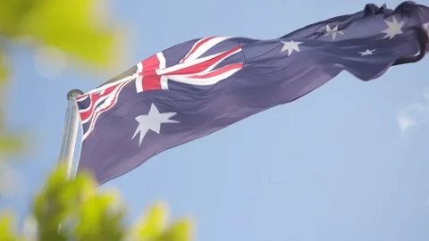 Australian flag waving in the wind 3 Stock Footage 106591617