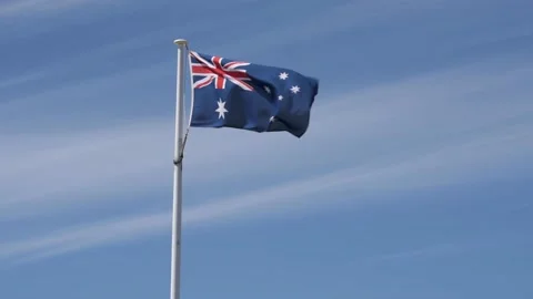 Australian flag in the wind slowed down motion 스톡 동영상 131279321