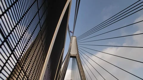 Australian flag in the wind at top of Anzac bridge slomo zoom 4K Stock Footage 269253537